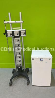 1 x iGenix Fridge (No Power) and 1 x Carefusion Alaris Docking Station Trolley