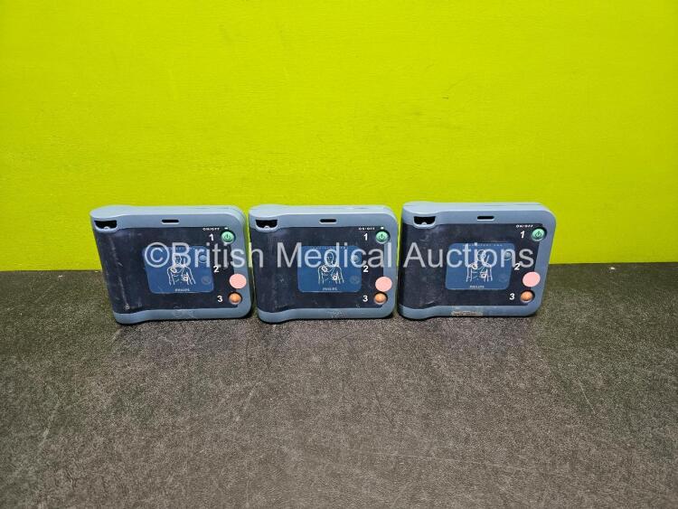 3 x Philips Heartstart FRX Defibrillators (All Power Up) with 3 x LiMNO2 Ref M5070A Batteries *Install Before - 2023 / 2024 / 2017* (1 x Flat)