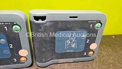 3 x Philips Heartstart FRX Defibrillators (All Power Up) with 3 x LiMNO2 Ref M5070A Batteries *Install Before - 2023 / 2024 / 2017* (1 x Flat) - 4