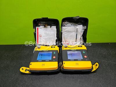 2 x Medtronic Lifepak 1000 Defibrillator *1 x Mfd - 2019 / 2019* (Both Power Up) in Case with 2 x Lithium Batteries *Install Before - 2025 / 2024*