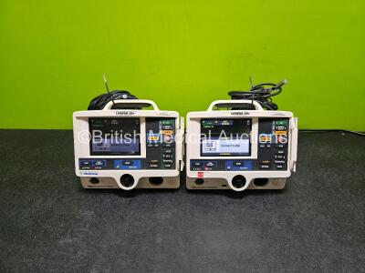 2 x Physio Control Lifepak 20e Defibrillators / Monitors *Mfd - 2012 / 2015* (Both Power Up) Including Pacer ECG and Printer Options with 2 x Paddle Leads, 2 x 3 Lead ECG Leads and 2 x Li-ion Batteries