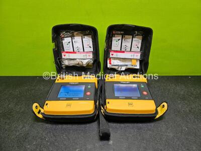 2 x Medtronic Lifepak 1000 Defibrillator *Mfd - 2015 / 2015 * (Both Power Up) in Case with 2 x Lithium Batteries *Install Before - 2029 / 2029*