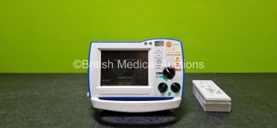 Zoll R Series ALS Defibrillator / Monitor (Powers Up and Cracked Dial - See Photo) Including Pacer, ECG and Printer Options with 1 x Paddle Lead, 1 x 3 Lead ECG Lead and 2 x Zoll SurePower Battery Packs Li-Ion *SN AF13B027332*