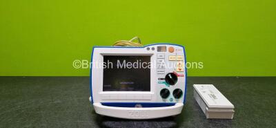 Zoll R Series ALS Defibrillator / Monitor (Powers Up and Cracked Dial - See Photo) Including Pacer, ECG and Printer Options with 1 x Paddle Lead, 1 x 3 Lead ECG Lead and 2 x Zoll SurePower Battery Packs Li-Ion *SN AF13B027329*