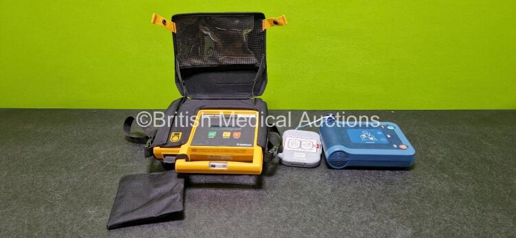 Job Lot Including 1 x Medtronic Physio Control Lifepak 500 with 1 x Li/SO2 Lithium Battery (Powers Up) in Case and 1 x Philips Heartstart FRx Defibrillator (Powers Up) with 1 x M5070A LiMnO2 Battery and 1 x Smart Pads II *Expired*