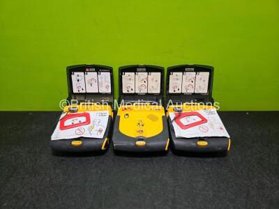 3 x Physio Control Lifepak CR Plus Defibrillators *Mfd - 2013 / 2006 / 2006* (All Power Up) in Case with 3 x Li/SC02CI2 Charge Paks