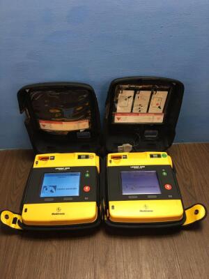 2 x Physio-Control/Medtronic Lifepak 1000 Defibrillators Version 2.51 with Carry Cases,2 x Batteries and 2 x Electrodes (Both Power Up)