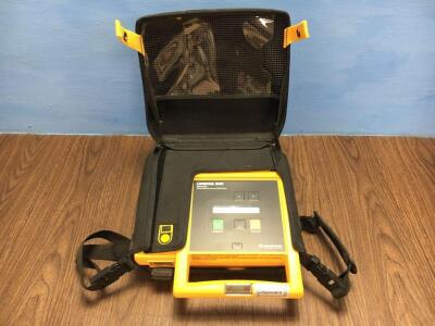 Lifepak 500 Biphasic Automated External Defibrillator (In German) with 1 x Physio Control Battery and Case (Untested Due to Possible Flat Battery)