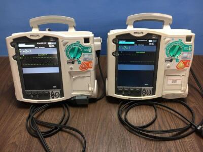 2 x Philips Heartstart MRx Defibrillators Including Pacer, ECG and Printer Options with 2 x Philips M3539A Batteries, 2 x Philips M3538 Module and 2 x