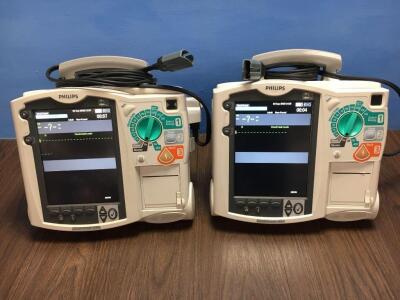 2 x Philips Heartstart MRx Defibrillators Including Pacer, ECG and Printer Options with 2 x Philips M3539A Battery, 2 x Philips M3538 Module and 2 x P