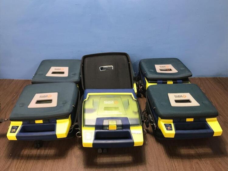 6 x Cardiac Science Powerheart AED G3 Automated External Defibrillators with 6 x Carry Bags (All Power Up when Tested with Stock Battery-Batteries Not