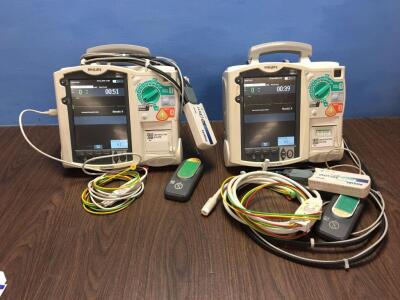 2 x Philips Heartstart MRx Defibrillators Including Pacer, ECG and Printer Options with 2 x Paddle Leads, 2 x ECG Leads,2 x 50 Ohm Test Loads, 2 x Lae