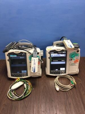 2 x Philips Heartstart MRx Defibrillators Including Pacer, ECG and Printer Options with 2 x Paddle Leads, 2 x ECG Leads,2 x 50 Ohm Test Loads, 2 x Lae