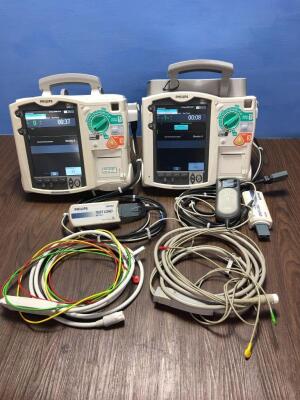 2 x Philips Heartstart MRx Defibrillators Including Pacer, ECG and Printer Options with 2 x Paddle Leads, 2 x ECG Leads,2 x 50 Ohm Test Loads, 1 x Lae