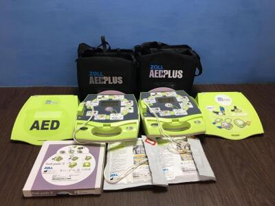 2 x Zoll AED Plus Defibrillators in Cases with Accessories (Both Power Up) (G)