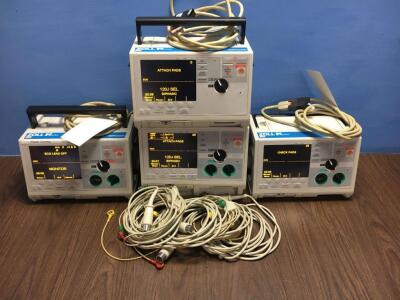 4 x Zoll M Series Defibrillators (3 x with Pacer Option) with 4 x Paddle Leads, 4 x 3 Lead ECG Leads and 4 x Batteries (All Power Up When Plugged in t