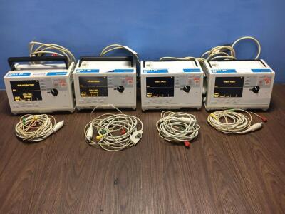 4 x Zoll M Series Defibrillators with 4 x Paddle Leads, 4 x 3 Lead ECG Leads and 4 x Batteries (All Power Up When Plugged in to Mains) *S/N T07L97681