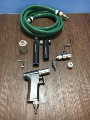 1 x Synthes Compact Air Drive II Handpiece, 1 x Synthes Oscillating Saw II and 1 x Synthes Reciprocating Saw with Hose and Attachments