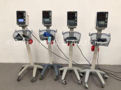 4 x Mindray Datascope Accutorr V Patient Monitors on Stands with 4 x BP Cuffs and 4 x BP Hoses (All Power Up- 1 x Battery Fault- Powers and Boots and