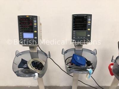 4 x Mindray Datascope Accutorr V Patient Monitors on Stands with 4 x BP Cuffs and 4 x BP Hoses (All Power Up- 1 x Battery Fault- Powers and Boots and - 2