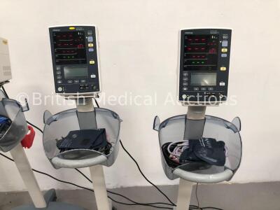 4 x Mindray Datascope Accutorr V Patient Monitors on Stands with 4 x BP Cuffs and 4 x BP Hoses (All Power Up- 1 x Battery Fault- Powers and Boots and - 3
