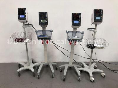 4 x Mindray Datascope Accutorr V Patient Monitors on Stands with 4 x BP Cuffs and 1 x BP Hose (3 x Power Up, 1 x Draws Power-Faulty Battery)