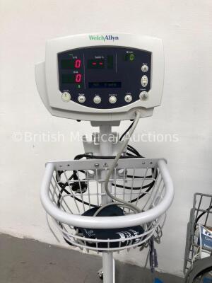 2 x GE Carescape V100 Dinamap Patient Monitors on Stands with 2 x BP Hoses, 2 x BP Cuffs and 2 x SpO2 Finger Sensors and 1 x Welch Allyn 53N00 Patient - 2