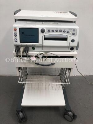 GE 250cx Series Fetal Monitor on Trolley with 2 x US Transducers,1 x TOCO Transducer and 1 x Finger Trigger (Powers Up) *C*