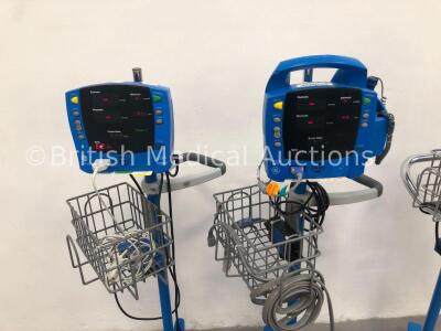 2 x GE Carescape V100 Patient Monitors on Stands with 1 x BP Hose and 1 x SpO2 Finger Sensor and 1 x GE Dinamap ProCare 400 Patient Monitor on Stand w - 2