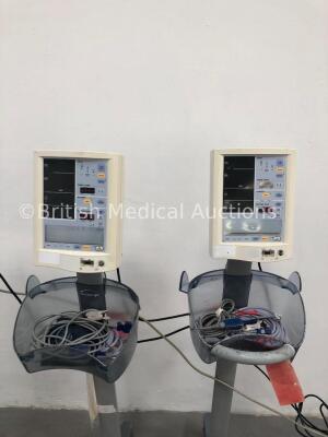 4 x Datascope Accutorr Plus Patient Monitors on Stands with 4 x BP Hoses, 4 x BP Cuffs and 4 x SpO2 Finger Sensors (All Power Up) - 3