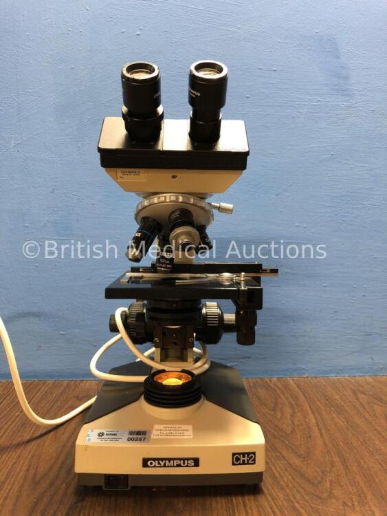 Olympus CH2 Microscope with 1 x Zeiss 40/0,65 Optic, 1 x Zeiss 10/0,22 Optic, 1 x Zeiss 3,2/0,07 Optic and 1 x Nikon Optic (Powers Up) *00257*