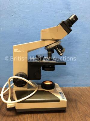 Olympus CH2 Microscope with 1 x Zeiss 40/0,65 Optic, 1 x Zeiss 10/0,22 Optic, 1 x Zeiss 3,2/0,07 Optic and 1 x Nikon Optic (Powers Up) *00257* - 2