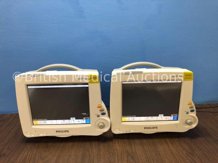 2 x Philips Intellivue MP30 Touch Screen Patient Monitors Version G.01.73 (Both Power Up) *Mfd 2009 / 2009* *C*