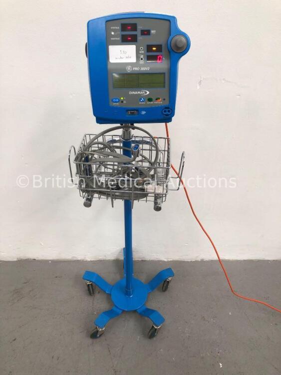 GE Dinamap Pro 300V2 Patient Monitor on Stand with 1 x BP Hose and 1 x SpO2 Finger Sensor (Powers Up) * SN AAX07310136SA *
