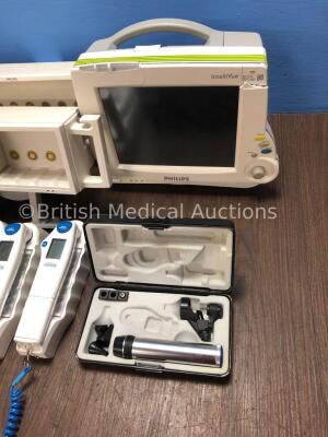 1 x Philips IntelliVue Patient Monitor (Spares and Repairs), 2 x Philips Module Racks, 1 x Masimo SET IntelliVue SPO2 Module (Damaged), 4 x First Temp - 2