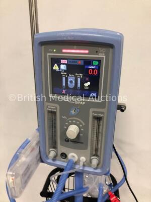 CareFusion Infant Flow SiPAP Part Number 675-CFG-004 on Stand with Hoses (Powers Up) * Mfd Sept 2009 * - 2