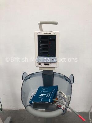 3 x Datascope Duo Patient Monitors on Stands with 2 x SpO2 Finger Sensors, 3 x BP Hoses, 3 x BP Cuffs and 1 x 3-Lead ECG Lead (All Power Up) * SN MD16 - 3