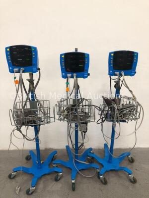 3 x GE Carescape V100 Dinamap Patient Monitors on Stands with 3 x SpO2 Finger Sensors, 3 x BP Hoses and 3 x BP Cuffs (All Power Up) * SN SDT08340028SP