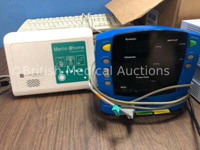 Mixed Lot Including 1 x Merlin @Home Transmitter with 1 x AC Power Supply (Powers Up) 1 x GE Carescape V100 Patient Monitor with 1 x AC Power Supply ( - 2