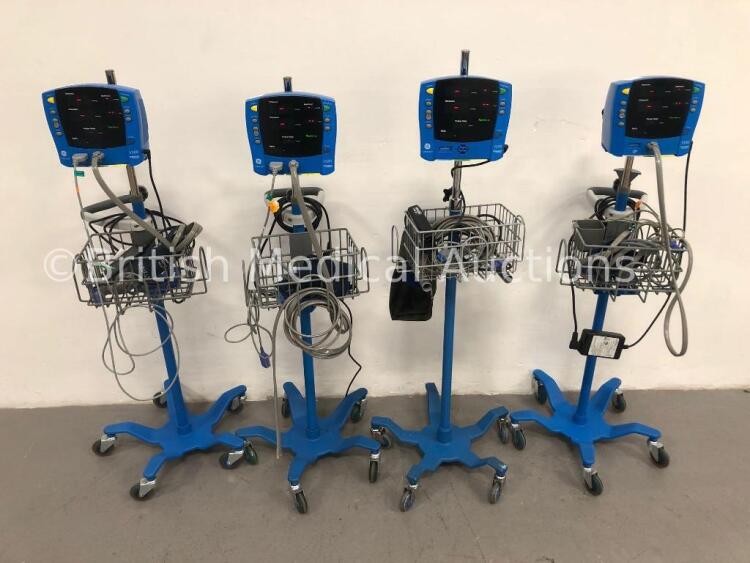 4 x GE Carescape V100 Dinamap Patient Monitors on Stands with 4 x BP Hoses,4 x BP Cuffs and 4 x SpO2 Finger Sensors (All Power Up) * SN SH614040092SA