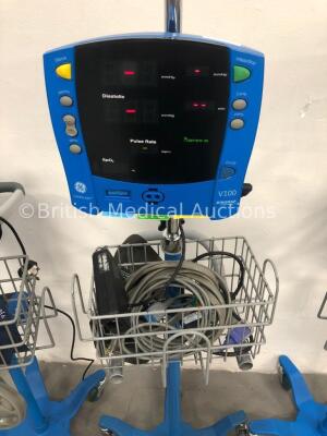 4 x GE Carescape V100 Dinamap Patient Monitors on Stands with 4 x BP Hoses,4 x BP Cuffs and 4 x SpO2 Finger Sensors (All Power Up) * SN SH614040092SA - 4