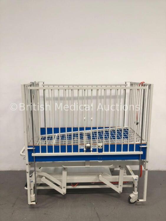 5 x Huntleigh Electric Cots with Controller (1 in Pictures 5 in Lot 1 x Damaged - Stock Photo Used) *S/N 578092 / GEL091055 / GEL092049 / GEL091409*