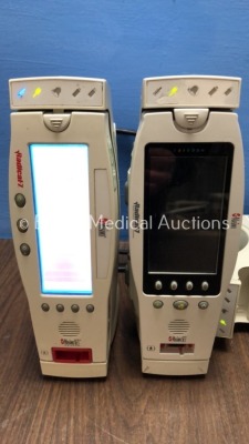 Mixed Lot Including 3 x Masimo Signal Extraction Pulse Oximeter Docking Stations (All Power Up) with 2 x Masimo Radical 7 Handheld Pulse Oximeters (1 - 2