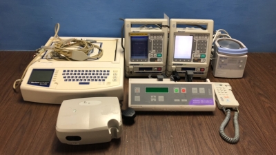 Mixed Lot Including 2 x Baxter Colleague CXE Infusion Pumps, 1 x Graseby 3150 Syringe Pump, 1 x Mortara ELI 250 ECG Machine with lead (No Power / Dama