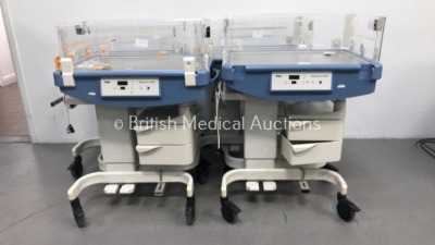 4 x Drager Babytherm 8000 Infant Incubators (All Power Up - 4 x No Lids, 1 x Missing Side Panel and 1 x Damaged Side Panel) * SN ASAC-0004 / ARYK-0011