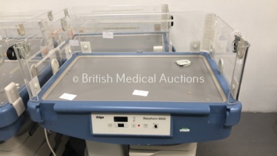 4 x Drager Babytherm 8000 Infant Incubators (All Power Up - 4 x No Lids, 1 x Missing Side Panel and 1 x Damaged Side Panel) * SN ASAC-0004 / ARYK-0011 - 2