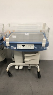 4 x Drager Babytherm 8000 Infant Incubators (All Power Up - 4 x No Lids, 1 x Missing Side Panel and 1 x Damaged Side Panel) * SN ASAC-0004 / ARYK-0011 - 5