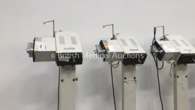 4 x Aesculap GA-140 Electrosurgical Unit on Stands with 4 x Aesculap GA-148 Footswitches - 3