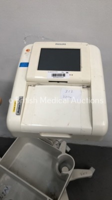 2 x Philips Avalon FM30 Fetal Monitors on Stands (1 x Powers Up,1 x Powers Up with Blank Screen and Broken Monitor, 1 x Missing Printer Panel-See Phot - 4
