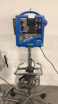 1 x Johnson and Johnson Critikon Dinamap Compact T Vital Signs Monitor on Stand and 1 x Dinamap Pro 1000 Patient Monitor on Stand with BP Hose,SpO2 Fi - 3